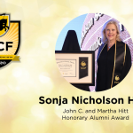 Woman poses with a certificate and wearing a sash next to a UCF award graphic. Text reads "Sonja Nicholson H'20 John C. and Martha Hitt Honorary Alumni Award.